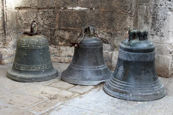 stock image Three old bronze bells