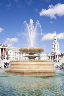 Fountain in Trafalgar Square in London clipart