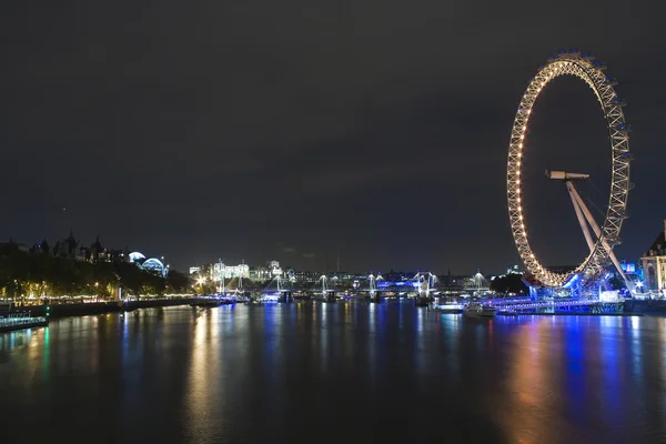 London eye oświetlony w nocy — Zdjęcie stockowe