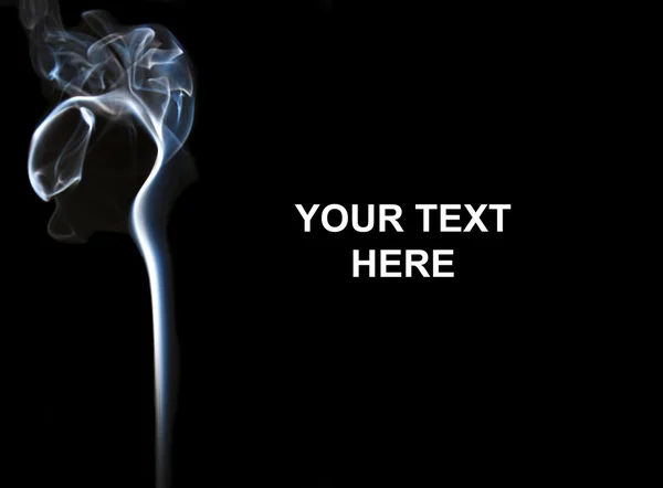 stock image Bright smoke in a black background with space to