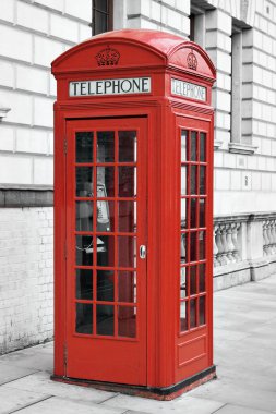 Red telephone booth in London, England clipart