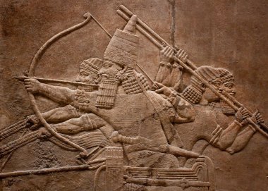 Ancient relief of assyrian fighting clipart