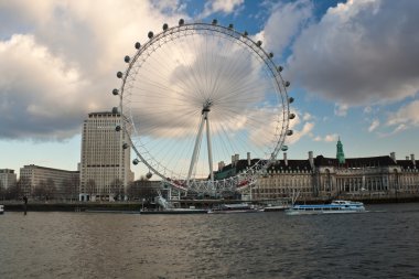 The London Eye on a cloudy day clipart