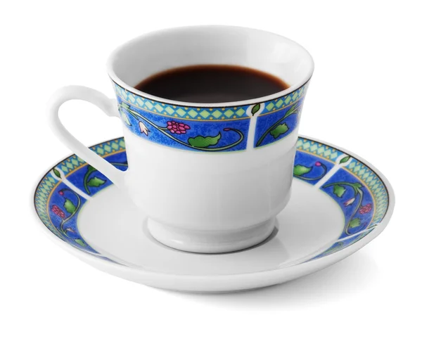 Eine Tasse Kaffee in einem bunten Teller — Stockfoto