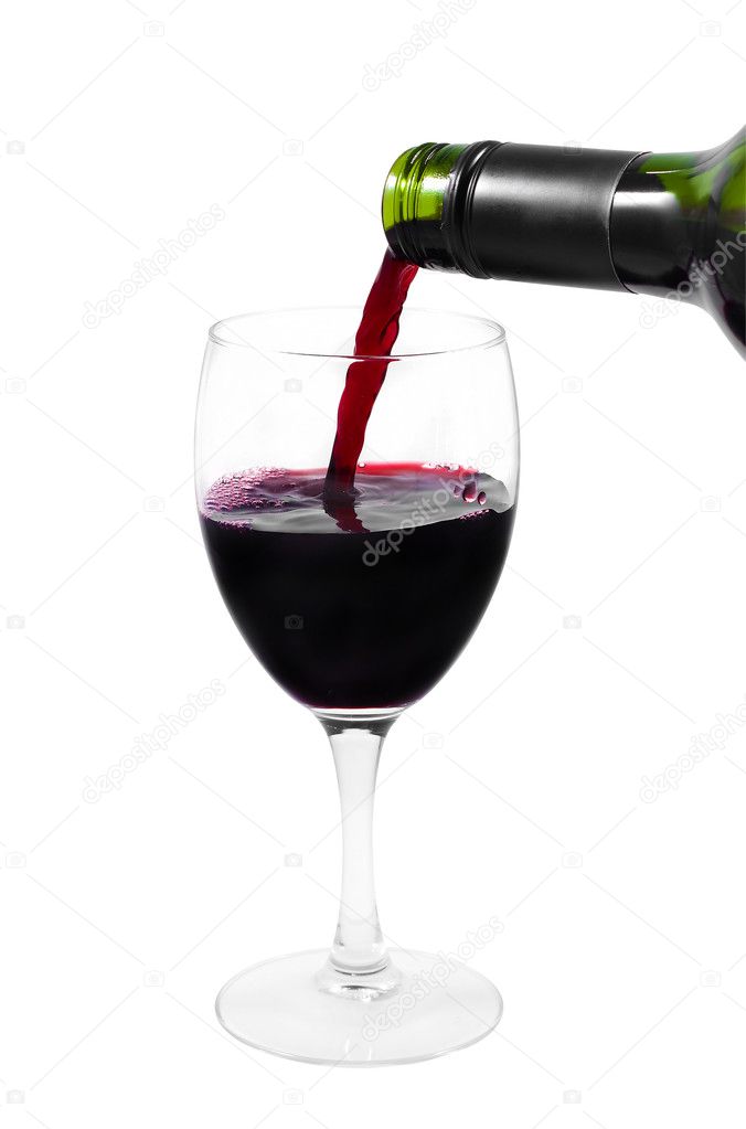 A bottle pouring red wine