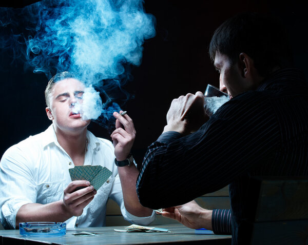 Two gamblers with cards