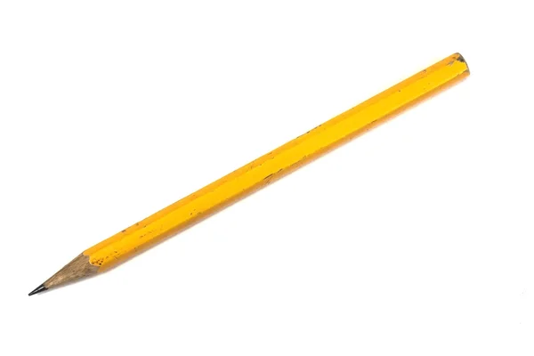 Желтый карандаш на белом фоне — стоковое фото
