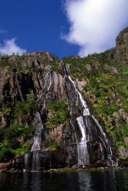 Waterfall in Trollfjord clipart