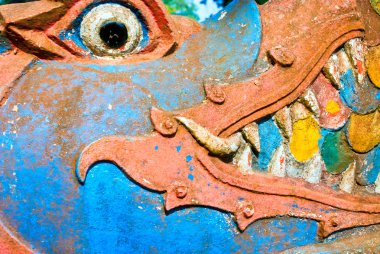 Close-up of a naga face in a buddhist temple, Lu clipart