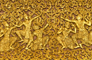 The ramayana epic carved on a wood door inside a clipart