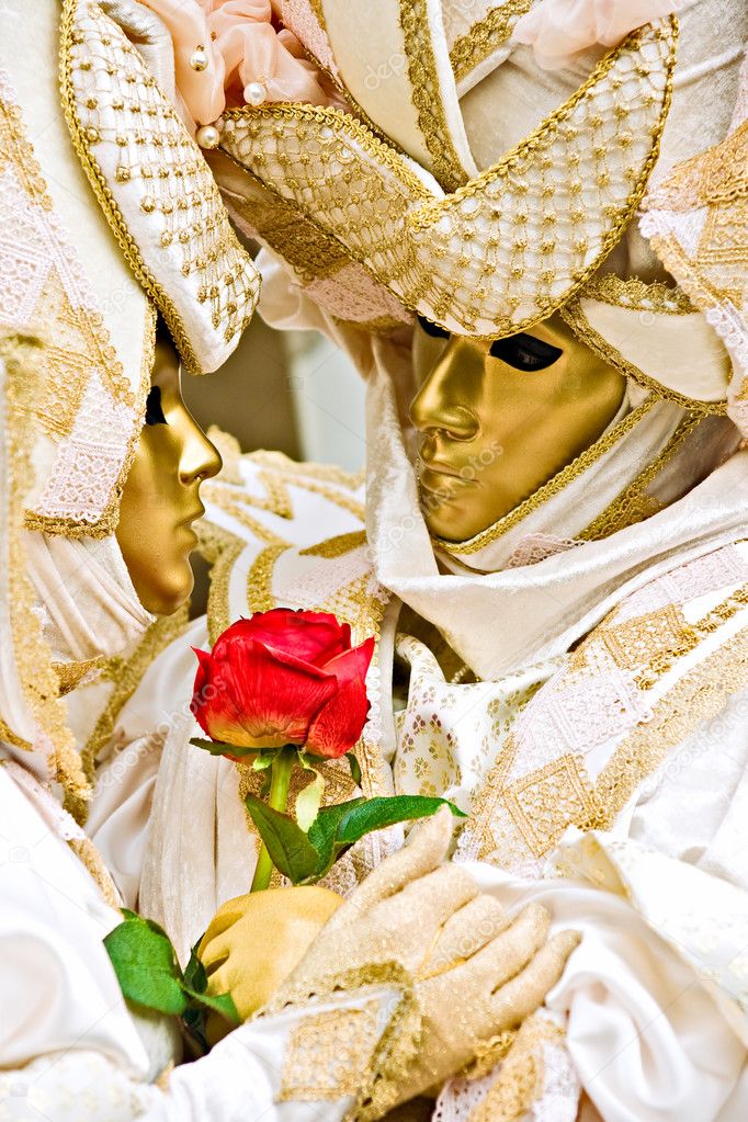 Two golden mask in Venice, Italy.