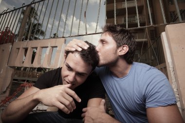 Man kissing his boyfriend on the head clipart