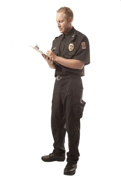 Ochroniarz przeglądając notatki — Zdjęcie stockowe