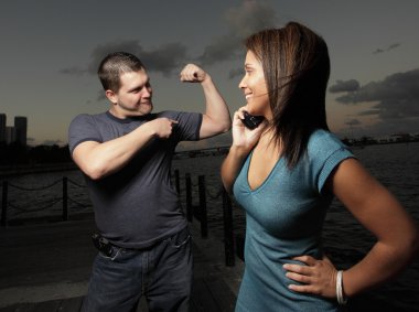 Man showing off his muscles clipart