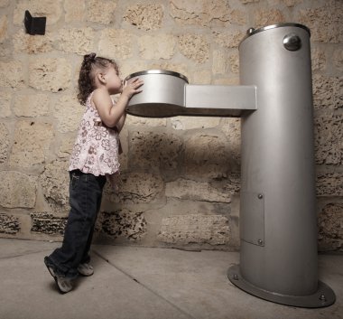 Child by the water fountain clipart