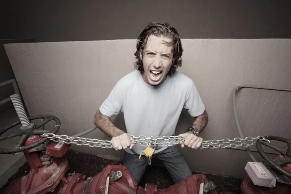 Man breaking the chains — Stock Photo, Image