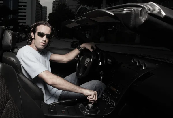Man in a sports car — Stock Photo, Image