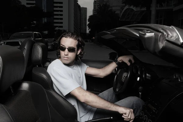 Man in a convertable — Stock Photo, Image
