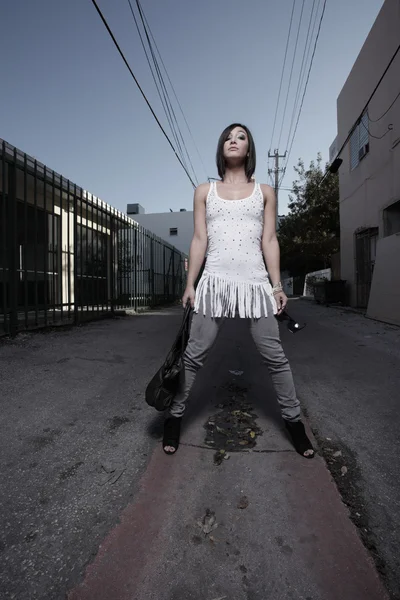 Woman posing in the alley — Stock Photo, Image