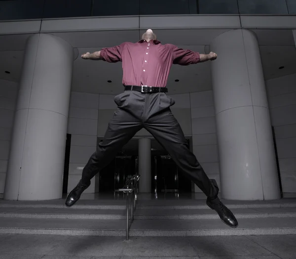 Empresário extático pulando — Fotografia de Stock