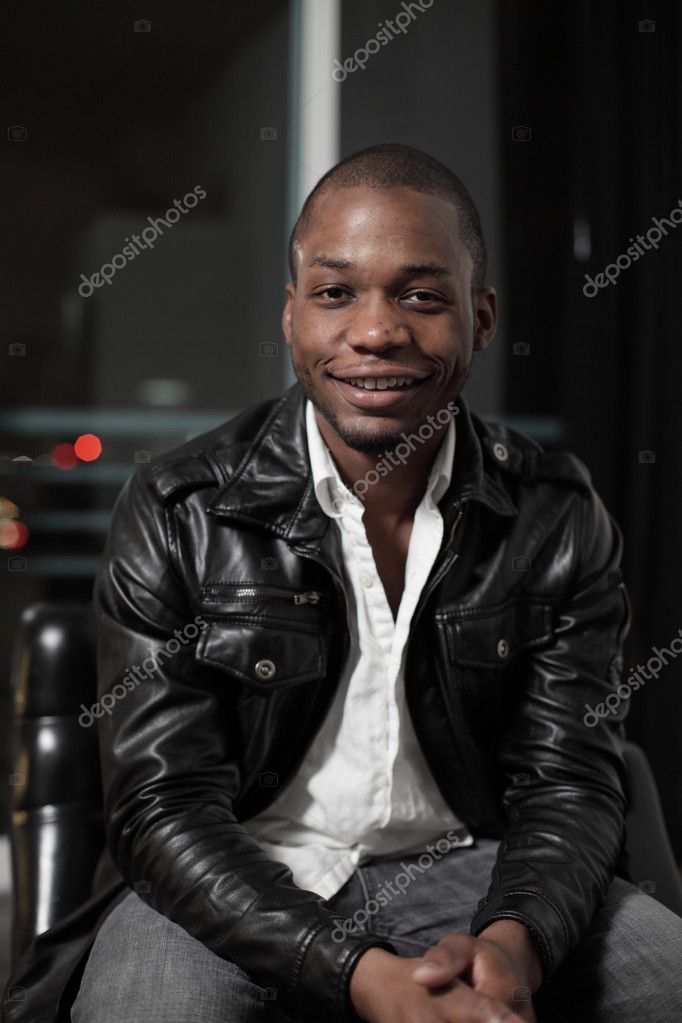 Handsome young black man smiling Stock Photo by ©felixtm 2596039