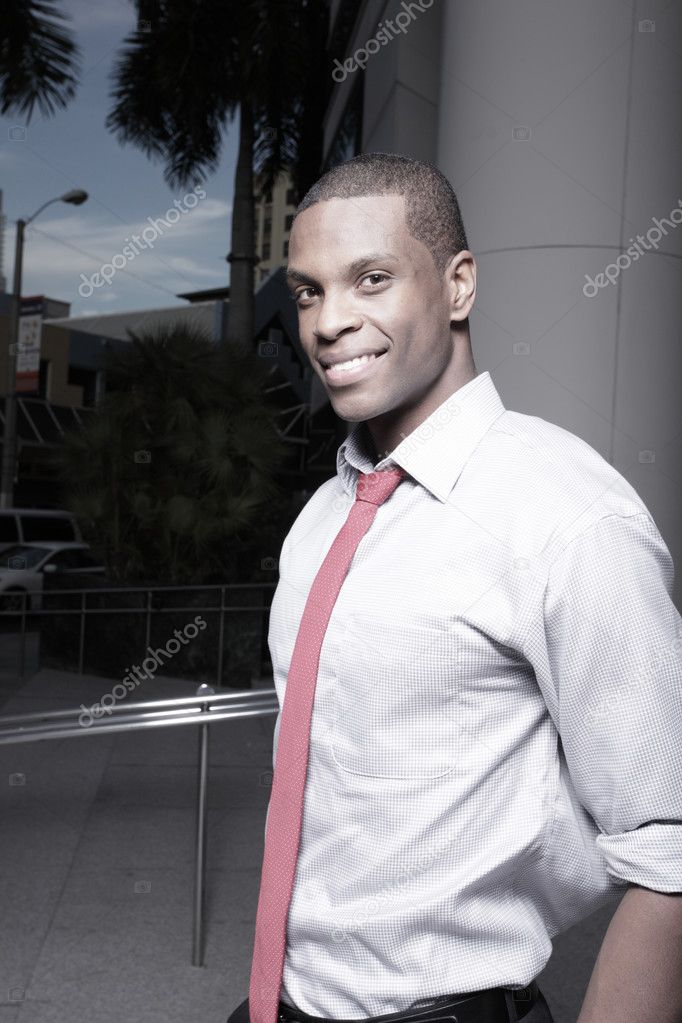 Businessman smiling at night