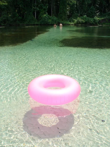 Floating pink rubber ring — Stock Photo, Image