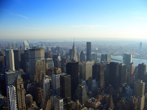 View over north east Manhattan and Chrysler building from Empire State building in the morning, New York