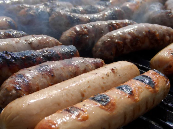 stock image Sausages on grill, horizontal