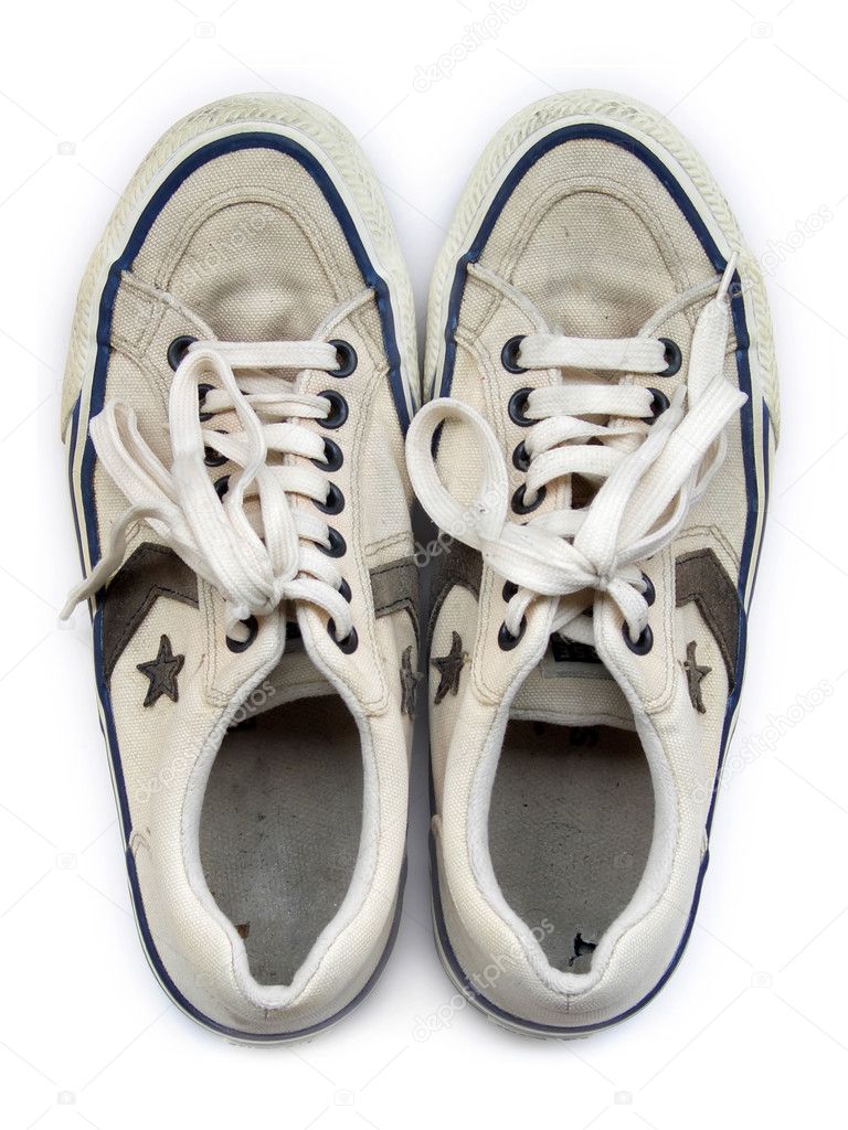 Old white worn sneakers seen from above — Stock Photo © msavoia #2463523