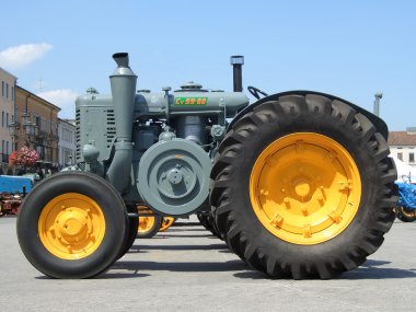 Old yellow grey tractor clipart