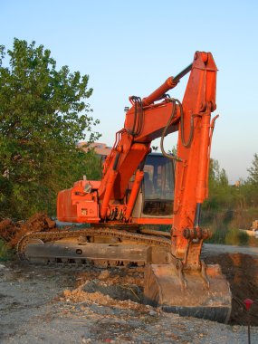 Orange excavator vertical clipart