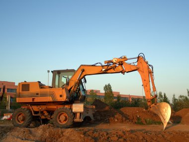 Orange excavator clipart