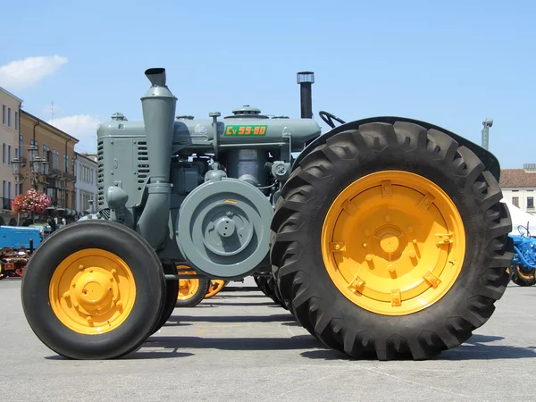 Old yellow grey tractor — Stock Photo, Image