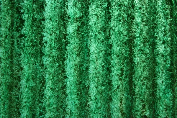 Grüne grungy Kunststoff Hintergrund — Stockfoto