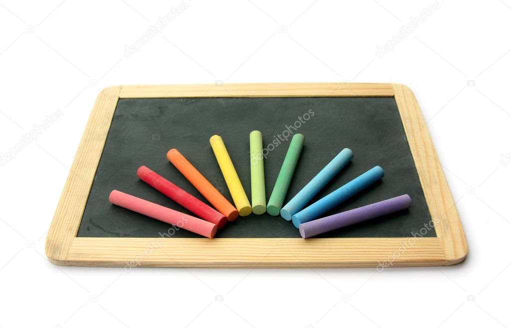 Blackboard and chalks in rainbow