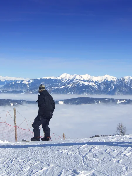 Snowboard a felhők felett — Stock Fotó