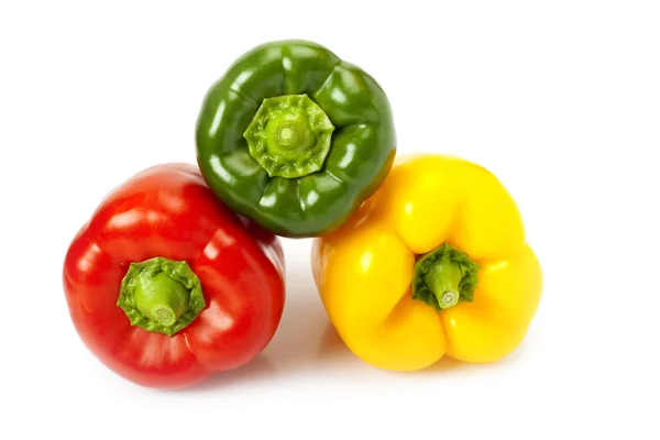 Gekleurde paprika's op witte achtergrond — Stockfoto