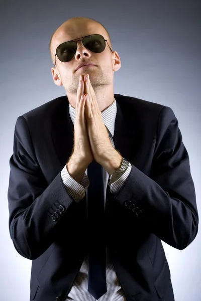 Businessman praying for success — Stock Photo, Image