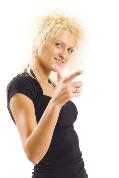 Parmağıyla işaret eden genç bir kadın — Stok fotoğraf