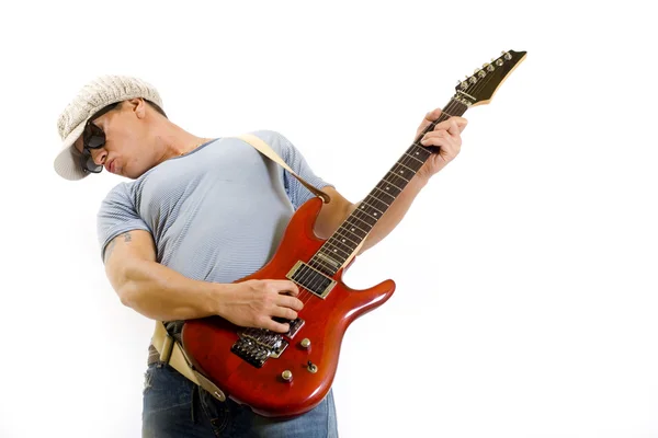 Músico tocando uma guitarra elétrica — Fotografia de Stock