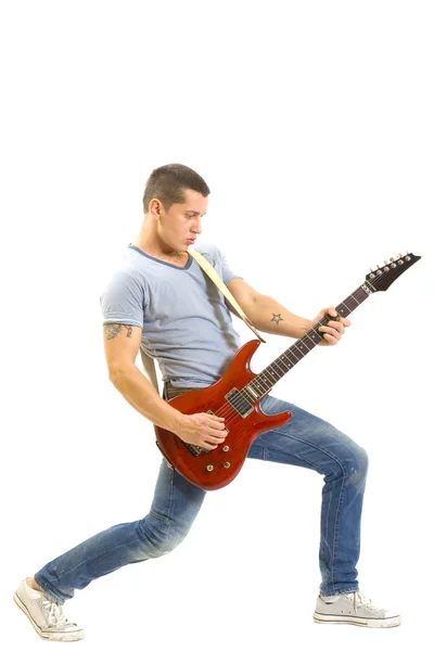 Mężczyzna gra na swojej gitarze — Zdjęcie stockowe