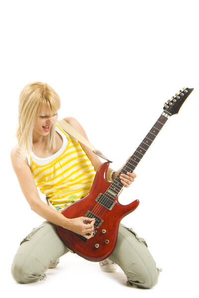 Rock girl playing an electric guitar