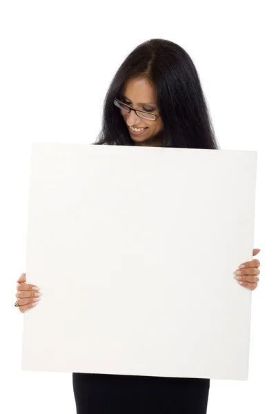 Young woman holding blank sign