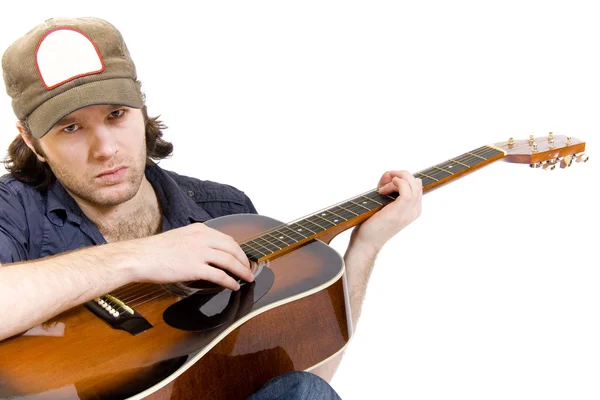 Guitarrista tocando una guitarra acústica —  Fotos de Stock