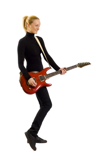 Menina com guitarra vermelha sobre branco — Fotografia de Stock