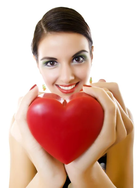 Woman offering her heart Stock Photo