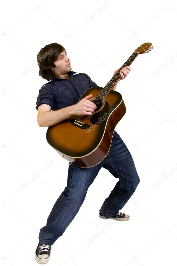 Man playing his acoustic guitar