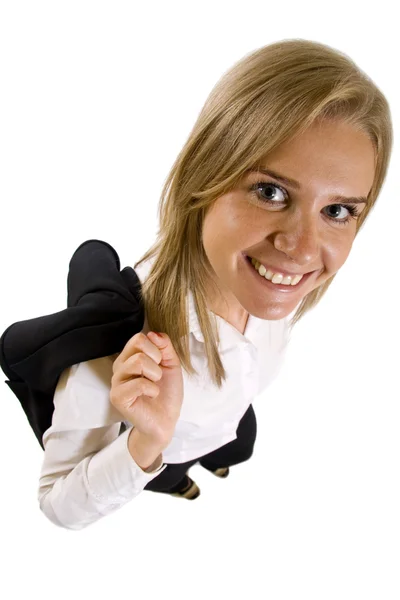 Happy businesswoman with coat on shoulder — Stock Photo, Image