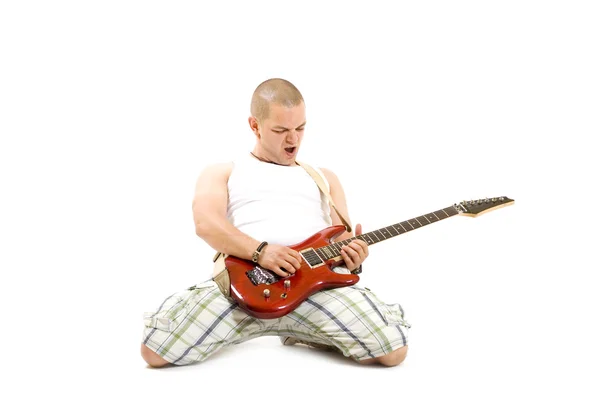 Ο άνθρωπος παίζει κιθάρα. — Φωτογραφία Αρχείου